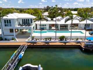 LUXURY WATERFRONT ESTATE, OFFERS RARE DUAL-LOT OPPORTUNITY