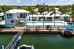 LUXURY WATERFRONT ESTATE, OFFERS RARE DUAL-LOT OPPORTUNITY