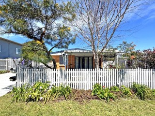 LOW MAINTENANCE LIVING IN THE HEART OF TOWN!