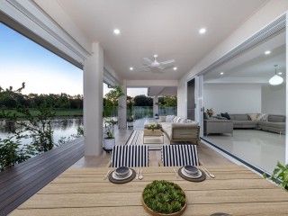 EXCLUSIVE LAKEFRONT LUXURY WITH PANORAMIC GOLF COURSE VIEWS