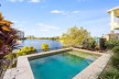 5-Bedroom Family Home Overlooking Lake Kawana - Prime Birtinya Location!
