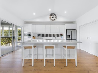 Coastal Hamptons Haven with Sweeping Views on Half an Acre