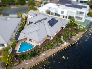 EXCLUSIVE LAKEFRONT LUXURY WITH PANORAMIC GOLF COURSE VIEWS