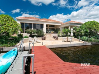 Luxurious waterfront living in a prestigious community