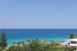 Sunshine Beach Magic: Renovated Penthouse with Rooftop Haven