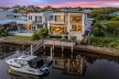FOUR LEVELS OF WATERFRONT LUXURY - COMPLETE WITH COMMERCIAL SIZED LIFT