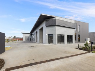AS NEW INDUSTRIAL UNIT