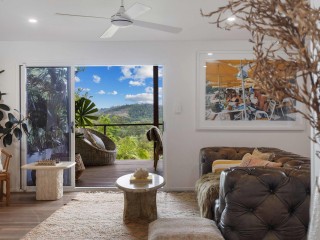 Dual-Living Property Surrounded By Lush Vegetation