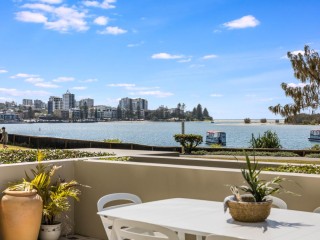 GROUND FLOOR COASTAL RETREAT WITH WATER VIEWS
