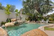 Beachside Delight: North Facing Pool & Lush Gardens